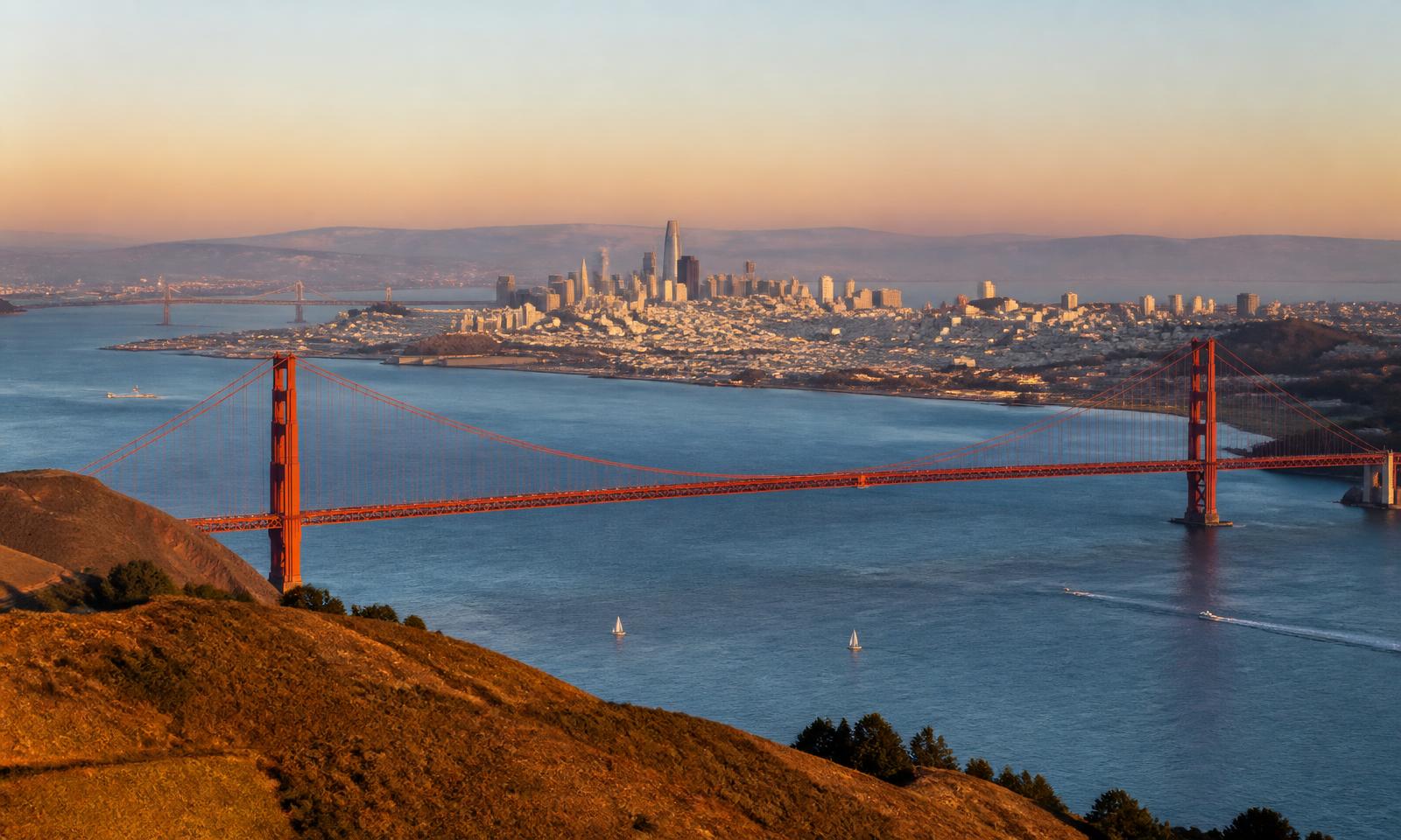 The Golden Gate Bridge and San Francisco skyline — AttiCal serves homeowners across the greater San Francisco Bay Area including Fremont, San Jose, and Oakland.